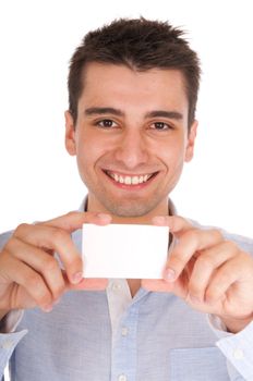 smiling young casual man holding blank white card (isolated on white background)