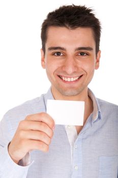 smiling young casual man holding blank white card (isolated on white background)