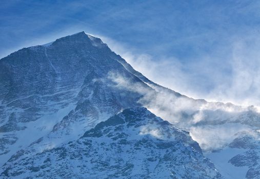 Blizzard on the Alps peaks in Mont Blanc Massif.