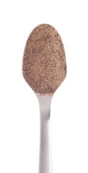 black pepper spice on a stainless steel spoon, isolated on white background