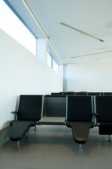 empty seats at departures terminal at a international airport