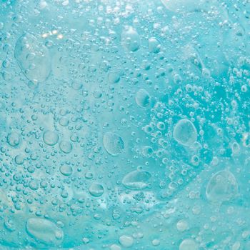 Blue bubbles in glass as a fresh background image