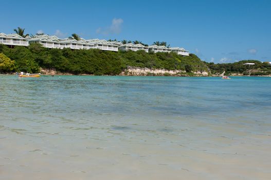 tropical beach and resort villas along the coast in Long Bay, Antigua