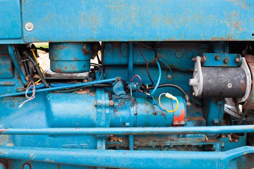 Close up of the parts of a vintage tractor engine
