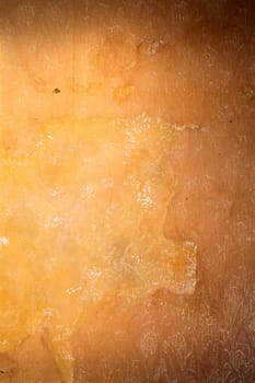 Old wall paper which has weathered over time