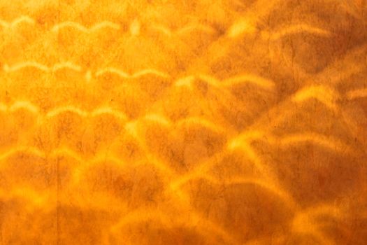 Interesting pattern of light on old grungy wall paper