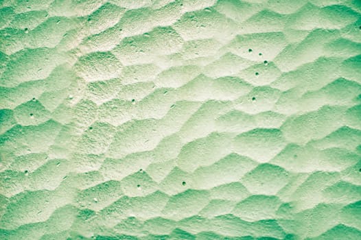 Close up of indented cement as a background image