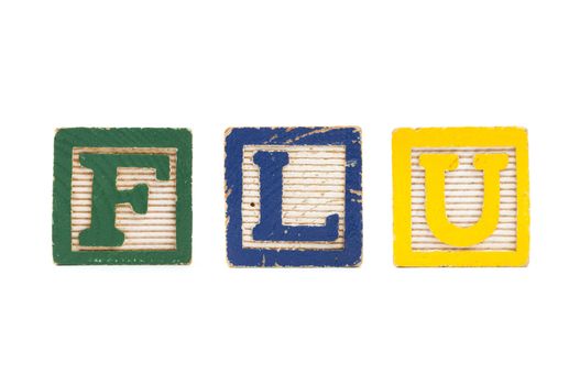 The word FLU created with children's blocks