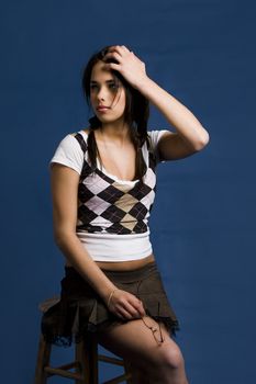 young woman dress as a naughty school girl