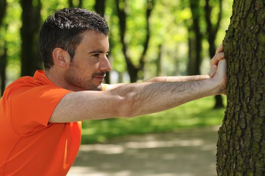 sportive and cheerful man in a natural background