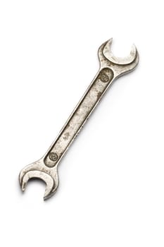 Metallic wrench isolated on white
