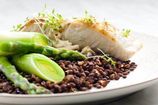 butterfish with green lentils, leek and green asparagus