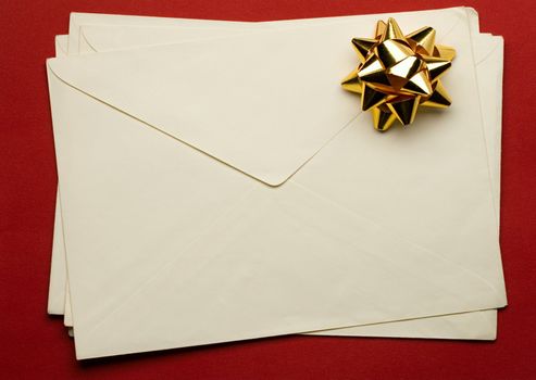 Envelope with ribbon isolated on white background