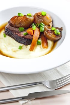 beef stew with carrot and mashed potatoes