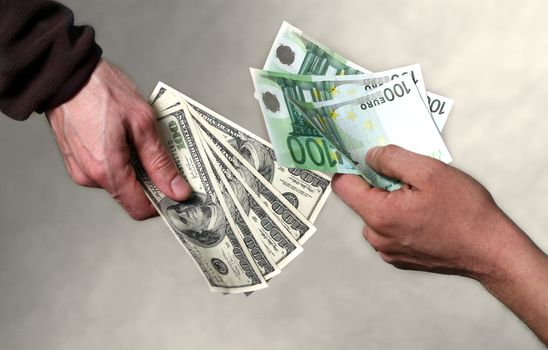 Two men exchange money. Giving money concept