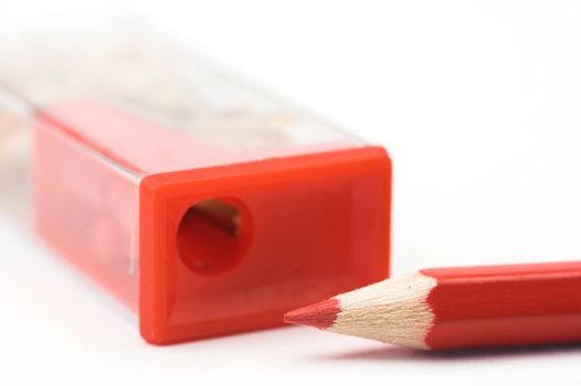 A red pencil and sharpener close up