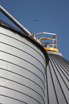 Grain reservoir detail  against a blue sky