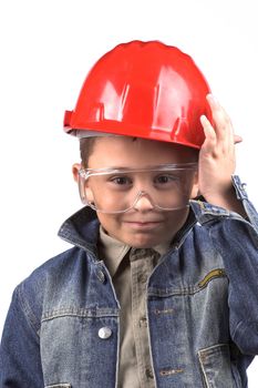 Portrait of a boy in a red protective helmet