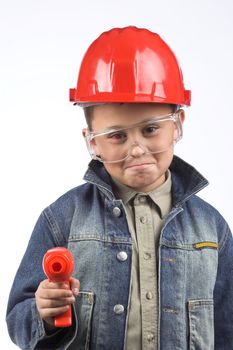 Portrait of a boy in a red protective helmet