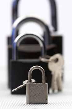 Padlocks and keys close up