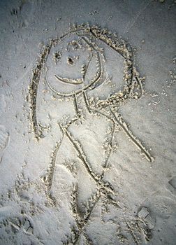 Children's image drawn on sand