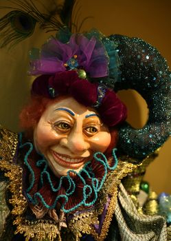 Portrait of the doll in a red cap