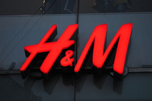 H & M Hennes & Mauritz AB (H&M) is a Swedish multinational retail-clothing company, known for its fast-fashion clothing for men, women, teenagers and children. H&M exists in 43 countries and as of 2011 employed around 94,000 people. It had 2,325 stores at end of 2011 and 2,629 stores at end of August 2012. It is ranked the second largest global clothing retailer, just behind Spain-based Inditex (parent company of ZARA).