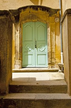 Wooden Door to the Patio in the French City