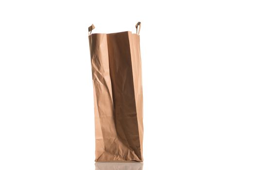 Profile shot of a brown carton bag isloated on white