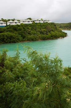 view of Long Bay with resort villas and seascape in Antigua (overcast weather)