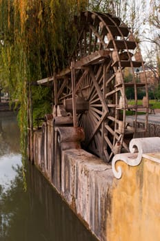 traditional watermill structure surrounded by trees in Tomar, Portugal