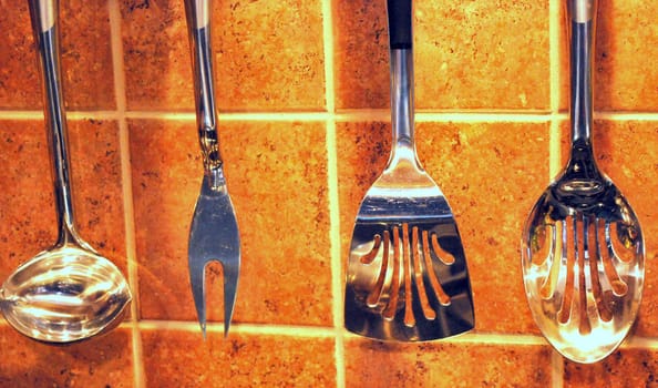 Kitchen utensils displayed indoors.