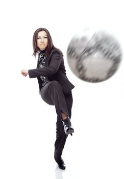 Businesswoman playing football