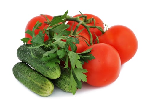 tomatoes, cucumbers and parsley on a white background