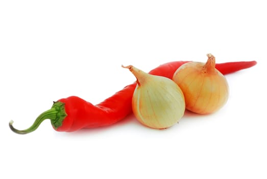 onions and peppers on a white background