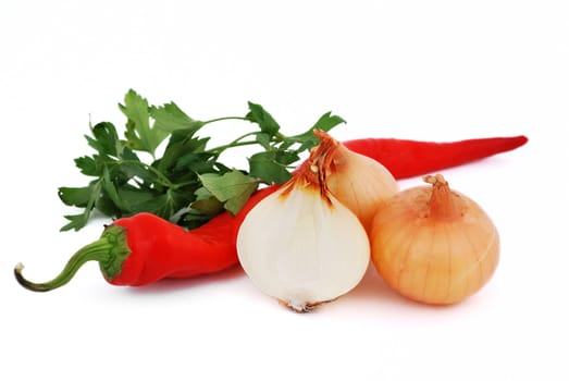 pepper, onion and parsley on a white background