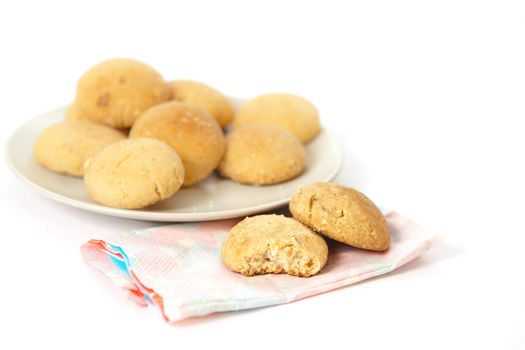 Plate of moroccan butter biscuits on white background