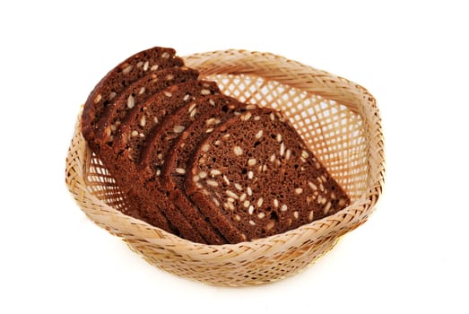 bread with seeds in a wooden basket