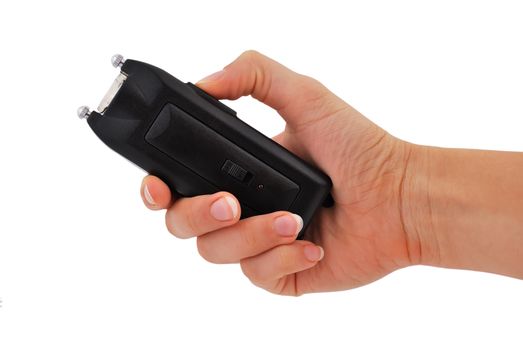 Woman's hand holding a 50,000 volt stun gun