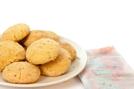 Plate of moroccan butter biscuits on white background