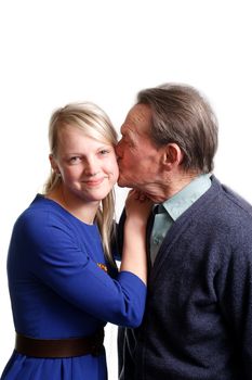 grandfather kissing granddaughter on white background