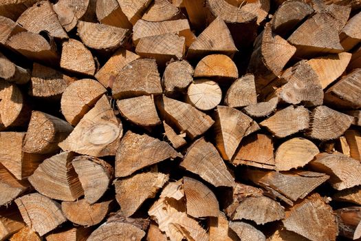 Freshly chopped and stacked firewood outdoor