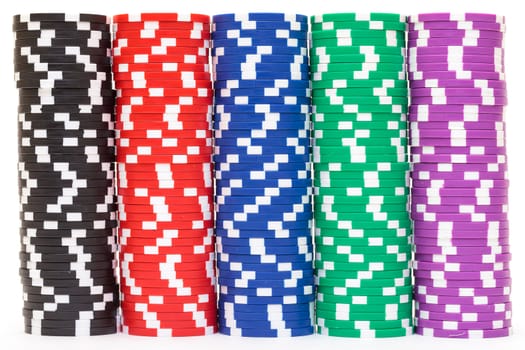 Stacks of Multicolored Poker Chips, closeup on white background