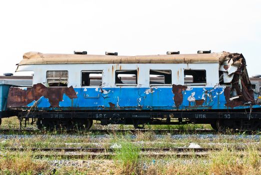 A wreckage of crashed or damaged train taken from train yard taken on sunny day, can be use for safety related communications
