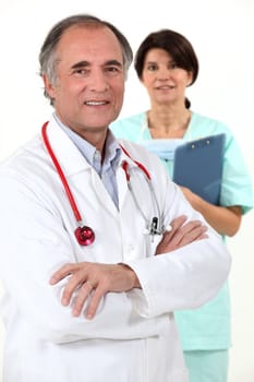 A practitioner and his nurse.
