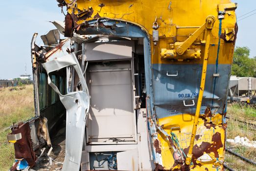 A wreckage of crashed or damaged train taken from train yard taken on sunny day, can be use for safety related communications
