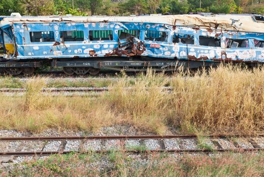 A wreckage of crashed or damaged train taken from train yard taken on sunny day, can be use for safety related communications
