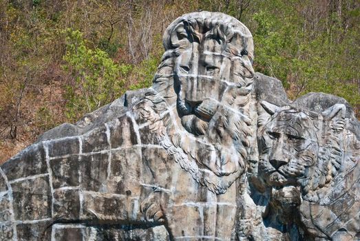 Large lion stone sculpture, taken on sunny afternoon