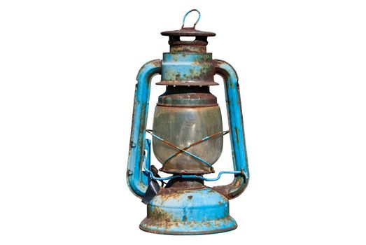 Old rusty oil lamp in isolated white background