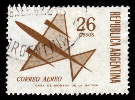 ARGENTINA - CIRCA 1963: A stamp printed in Argentina shows flight of symbolic airplane , brown, circa 1963.